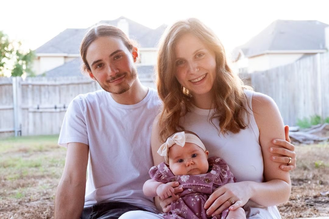 Landon Melvin with his wife and daughter